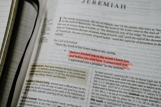 Open bible with highlighted verse from jeremiah.